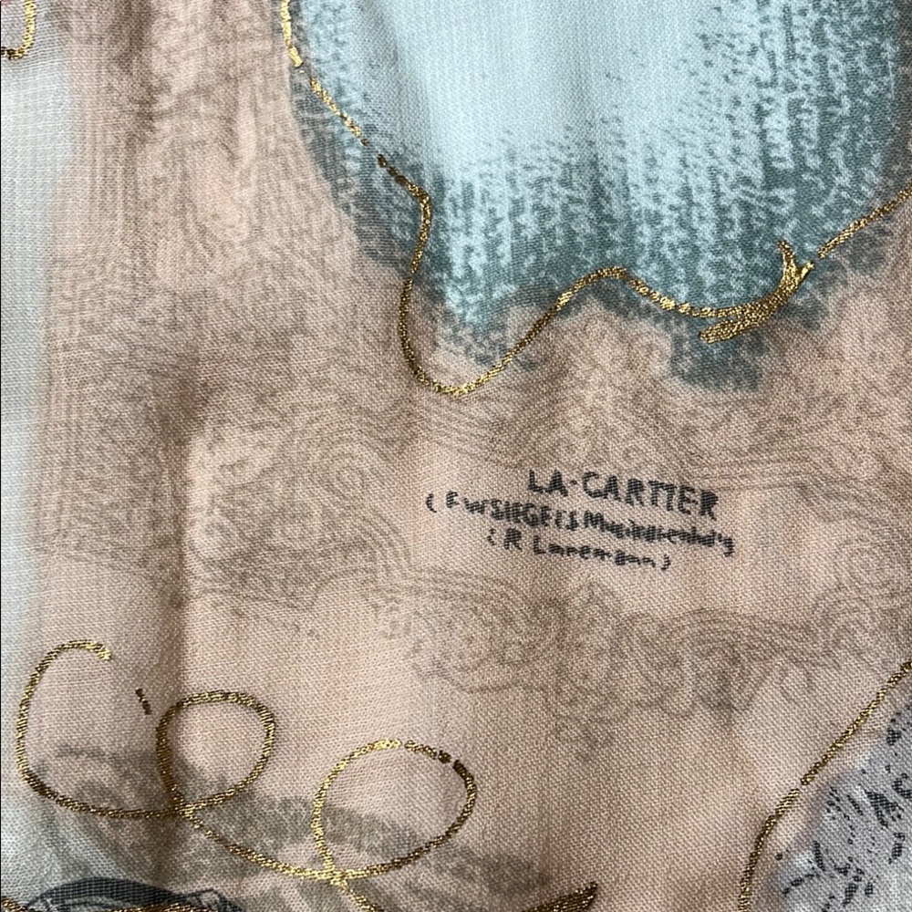 La Cartier Silk  shear Scarf with Gold Accents 60”L x 13” W .